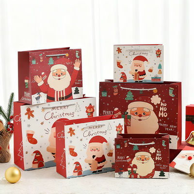 কাস্টম আকার মুদ্রিত ক্রাফ্ট ক্রিসমাস ব্যাগ রিবন হ্যান্ডেল সহ বিলাসবহুল উপহার ব্যাগ